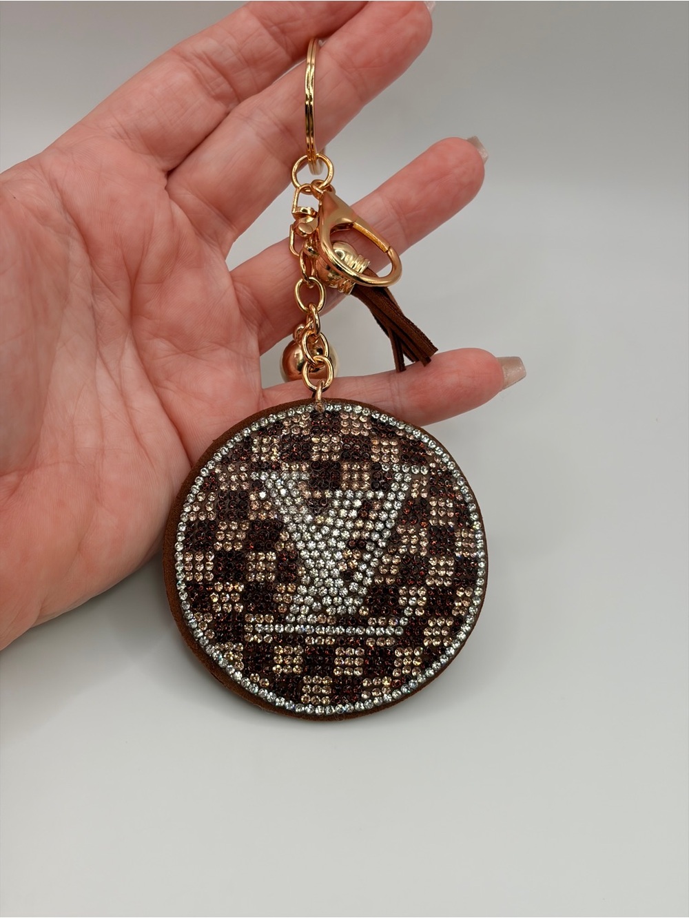 Crystal-Embellished Round Keychain Charm in Brown and Gold